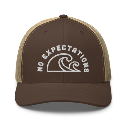 Unisex Embroidered Retro Trucker Hat featuring the No Expectations Wave logo on the front, part of the No Expectations brand collection Brown Khaki