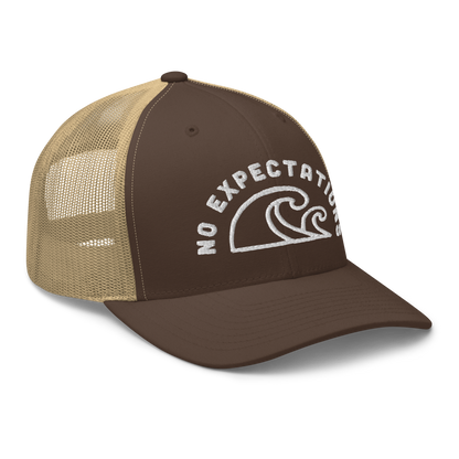 Unisex Embroidered Retro Trucker Hat featuring the No Expectations Wave logo on the front, part of the No Expectations brand collection Brown Khaki