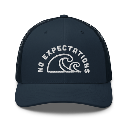 Unisex Embroidered Retro Trucker Hat featuring the No Expectations Wave logo on the front, part of the No Expectations brand collection Navy